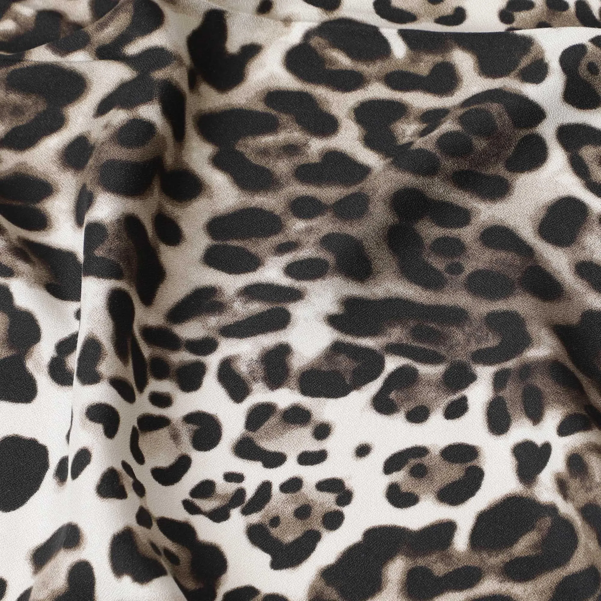 Light beige viscose crepe fabric with dark mustard and brown print in Animal skin design-D7058